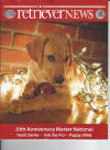 Ally on the cover of December Retriever News -  Owners Dave and Deana Wolfe and Bob and Barbara Hayden
